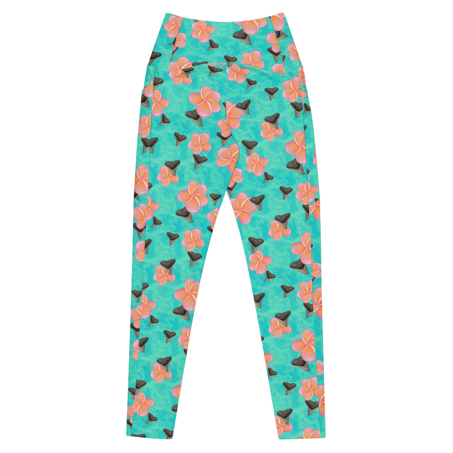 A teal and mint swirly background with Bull shark teeth and pinky orange plumeria flowers on our Shark Tooth Paradise Recycled Dive Leggings with pockets