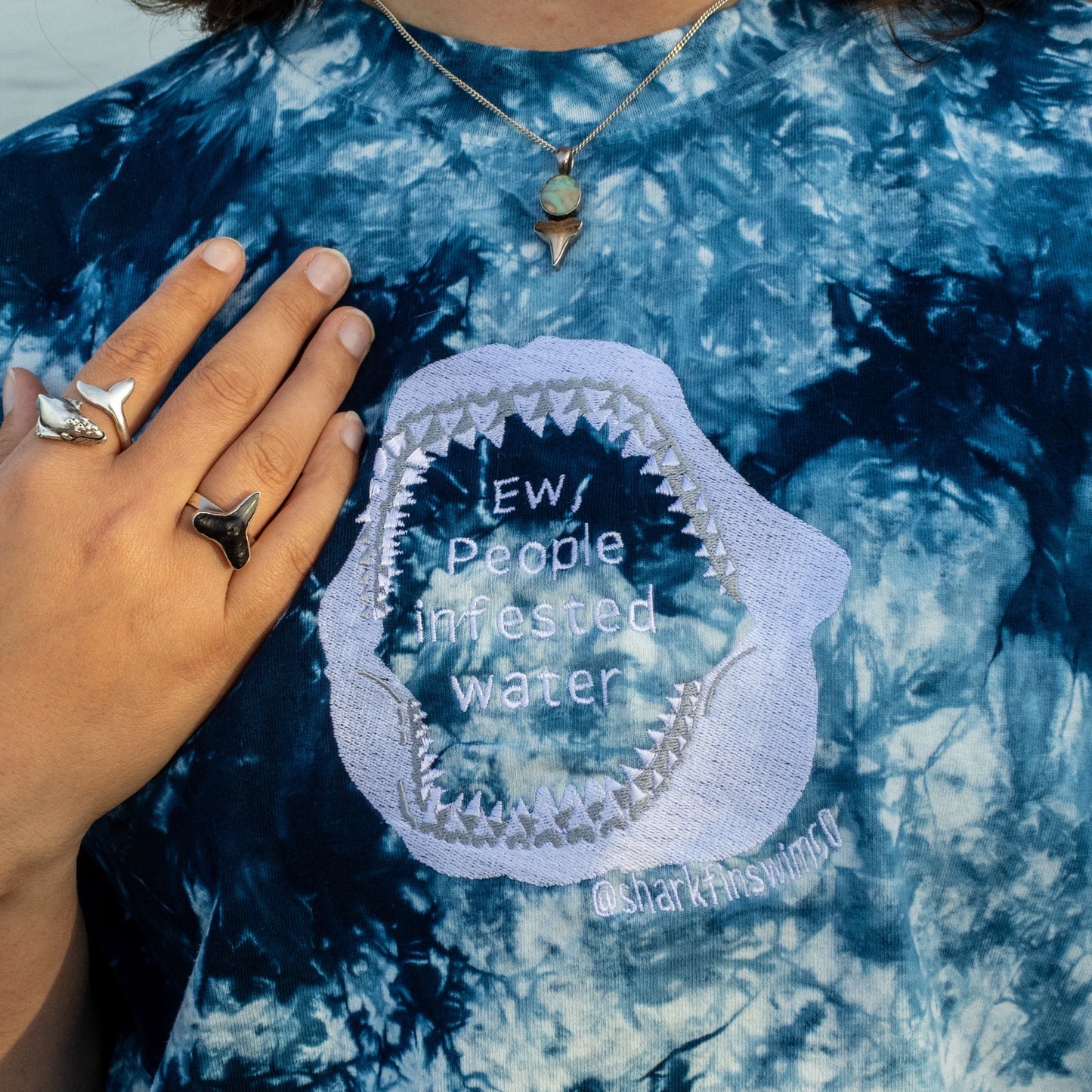 Navy and white to dye oversized t shirt with “ew people infested water” inside of a shark jaw embroidered on the front