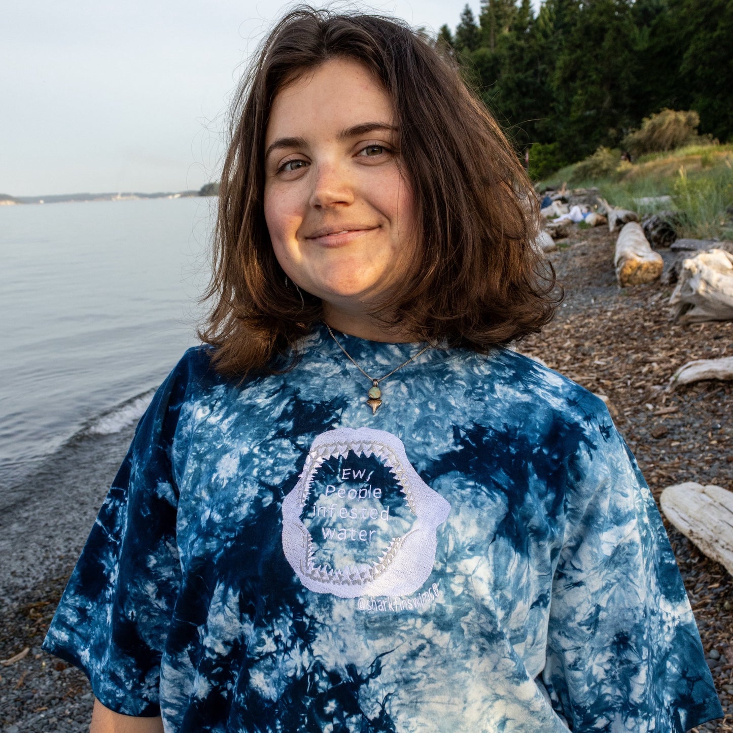 Navy and white to dye oversized t shirt with “ew people infested water” inside of a shark jaw embroidered on the front