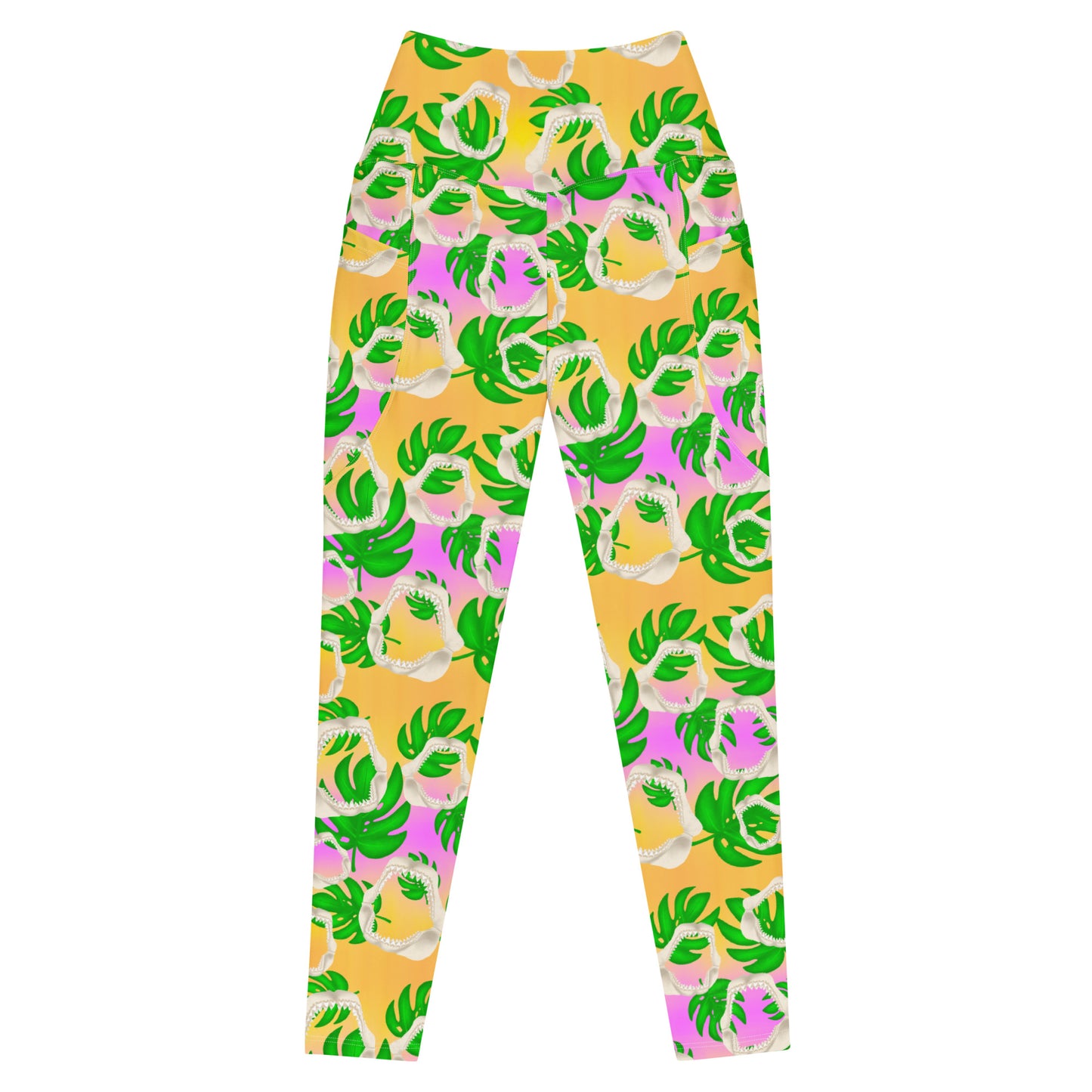 A warm golden yellow and pinky lilac sunset ombré background with megalodon jaws and monstera leaves on our Meg Monstera Recycled dive leggings with pockets
