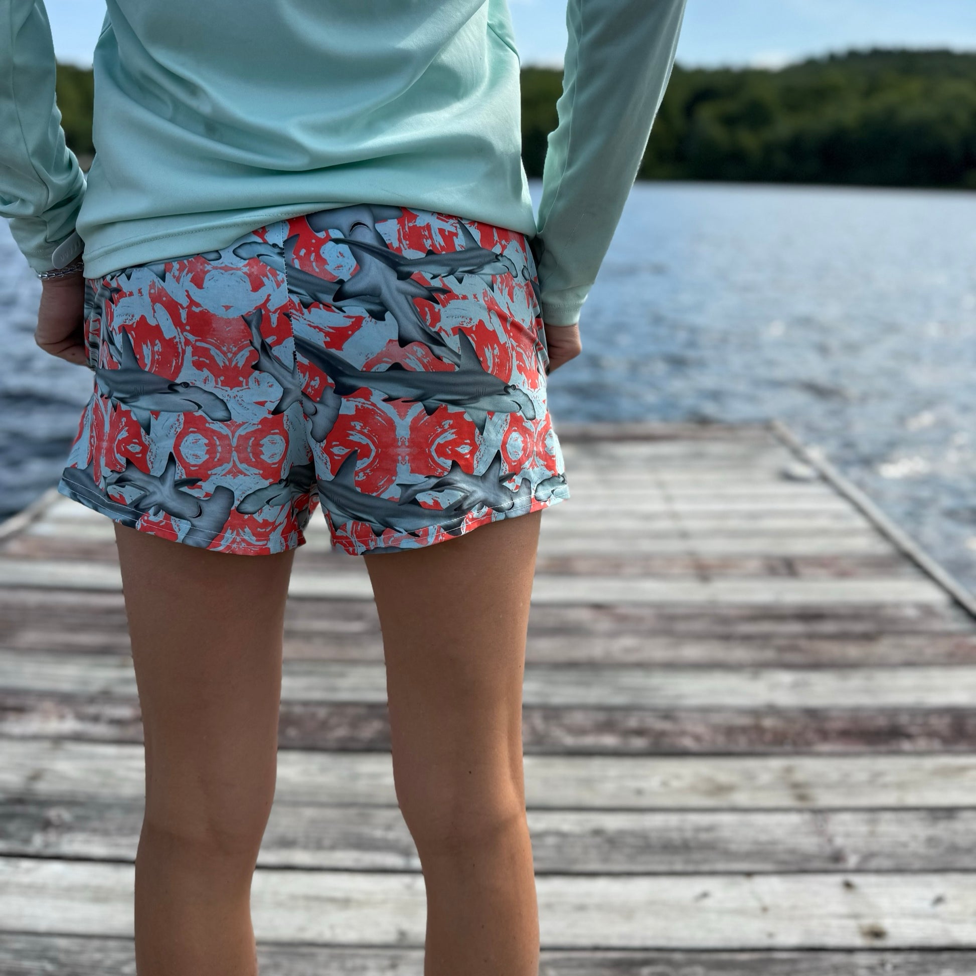 Fin & Fierce Hammerhead sustainable athletic short blue and red background