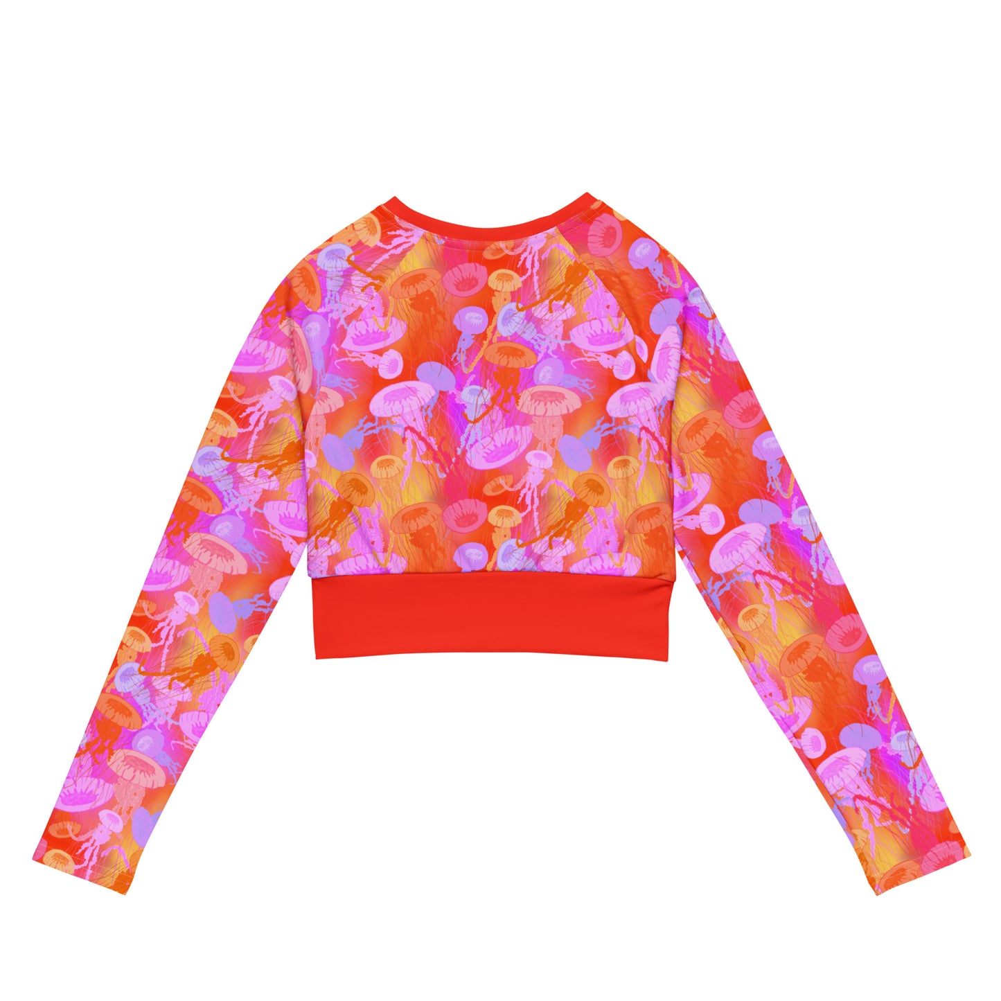 Pacific sea nettle jellyfish with shades of red, orange pink and purple on a cropped rashguard made with recycled fabric. 