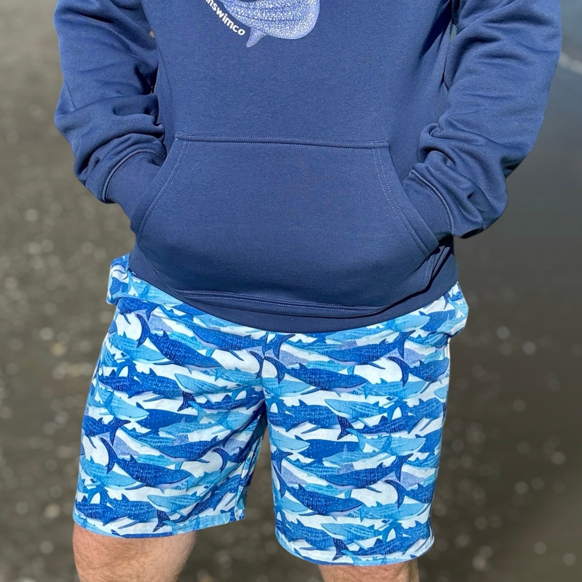 Blue glitter whale sharks on eco swim trunks 