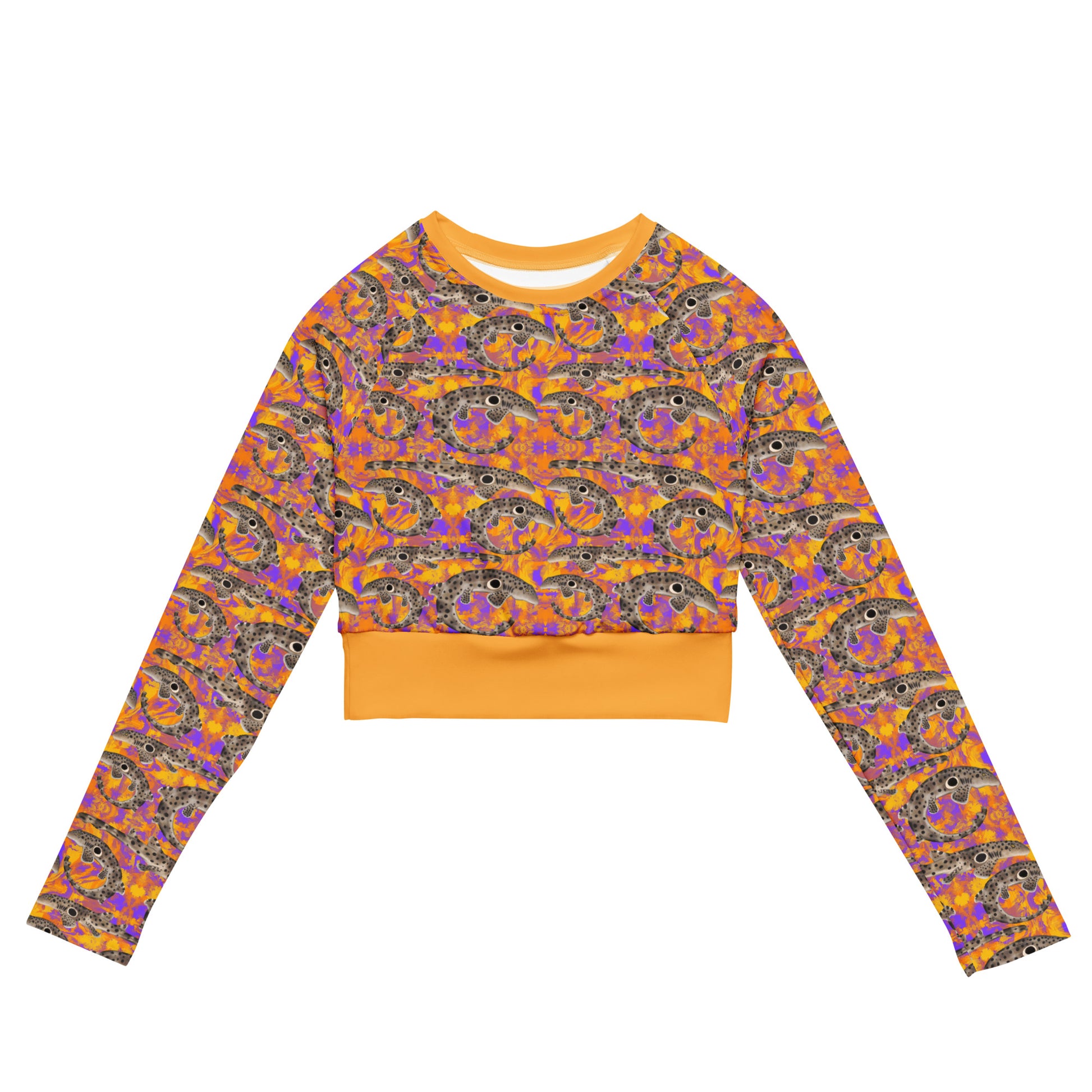 Epaulette Shark cropped rashguard with orange and purple background 