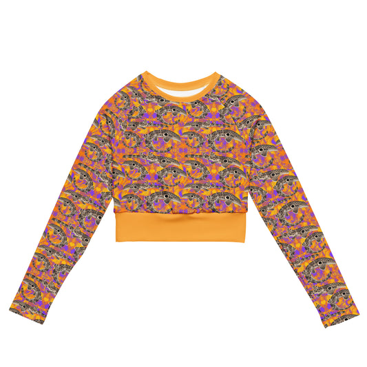 Epaulette Shark cropped rashguard with orange and purple background 