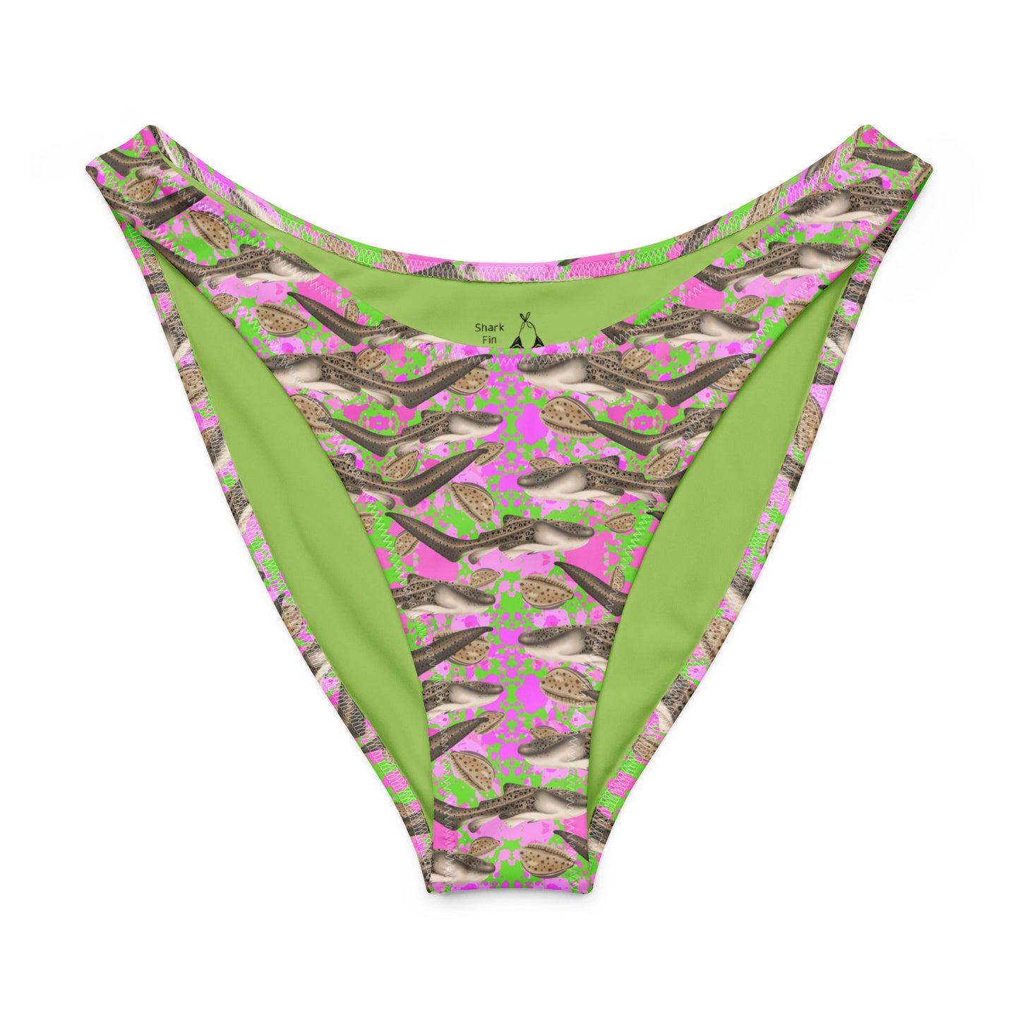 Green and pink patterned bikini bottom with zebra sharks and cowrie shells on a white background