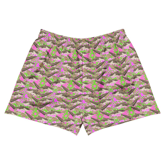 Pink and green swim shorts with zebra sharks and cowrie seashells 