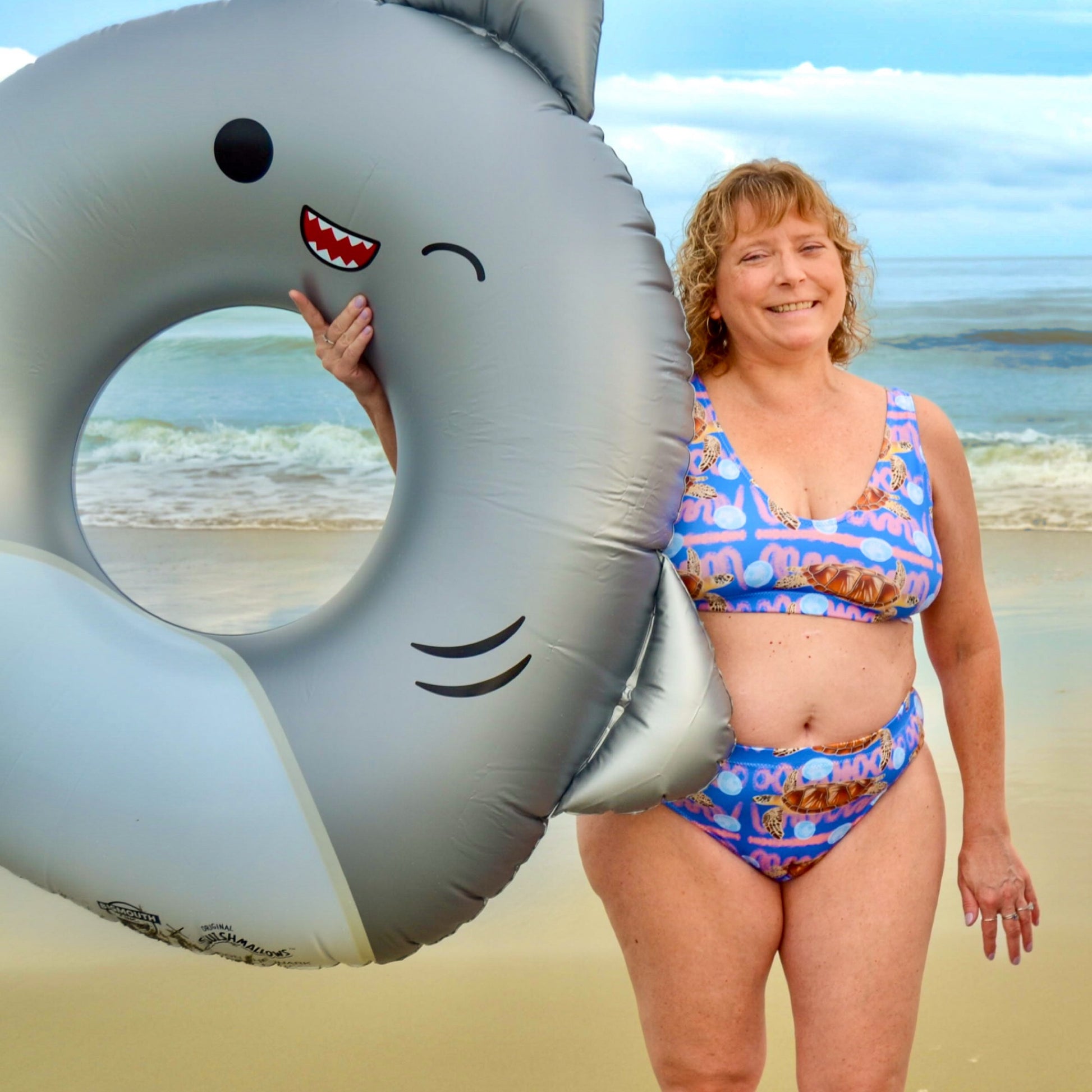 Royal blue and peachy background with sea turtles and moon jellyfish. Eco high waisted bikini bottoms 