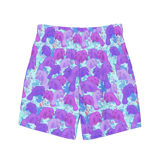 Purple manatees on a blue background of a sustainable swim trunks made with recycled fabric 