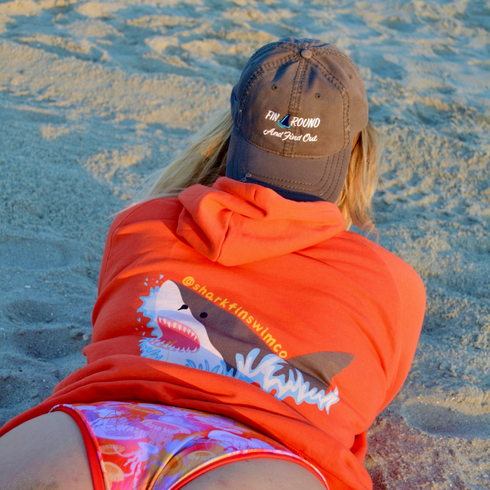 Eco-friendly distressed baseball cap with a shark fin as the A in “around” fin around and find out 