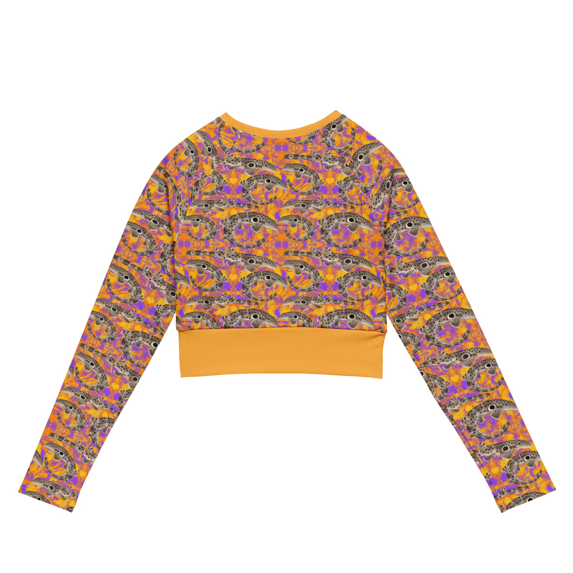 Epaulette Shark cropped rashguard with orange and purple background 