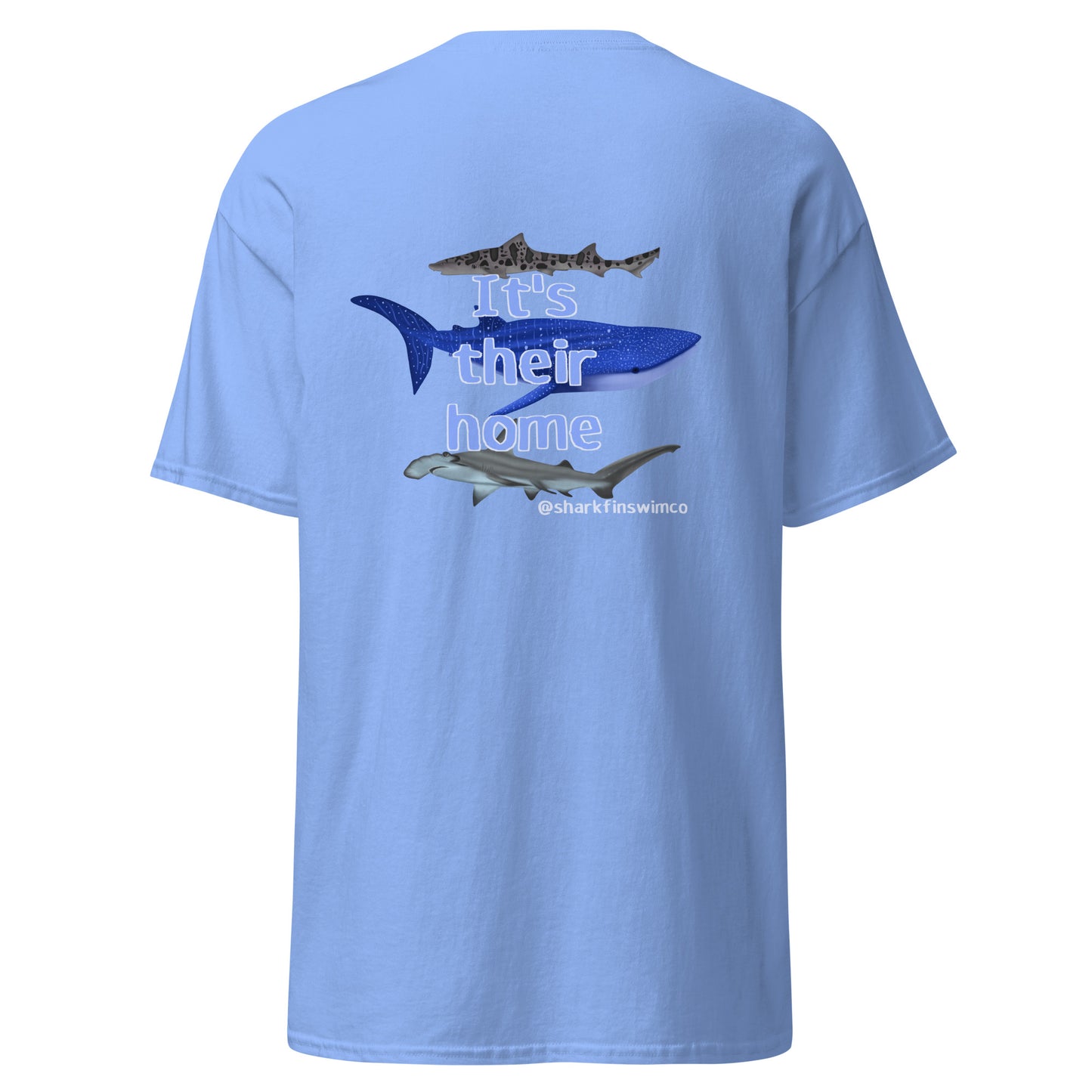 Light blue t-shirt with shark graphics and text on the back against a white background