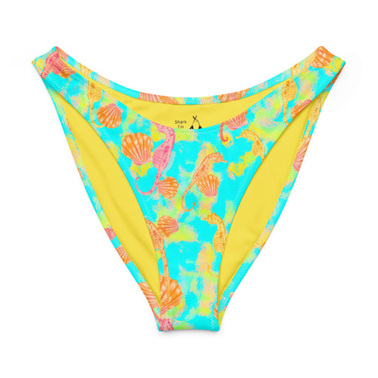 Pink and orange seahorses with sunrise seashells. Light aqua blue and yellow background with a neon yellow band. Eco high cut bikini bottom