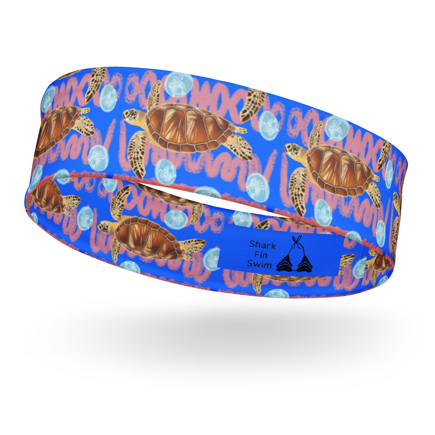 Royal blue and peachy background with sea turtles and moon jellyfish Eco dive headband