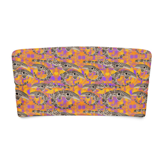 Epaulette Shark eco bandeau bikini top with orange and purple background