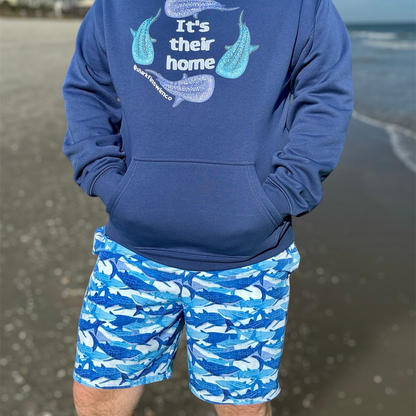 Blue glitter whale sharks on eco swim trunks 