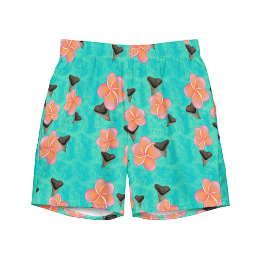 A teal and mint swirly background with Bull shark teeth and pinky orange plumeria flowers on our Shark Tooth Paradise Recycled Swim Trunks 