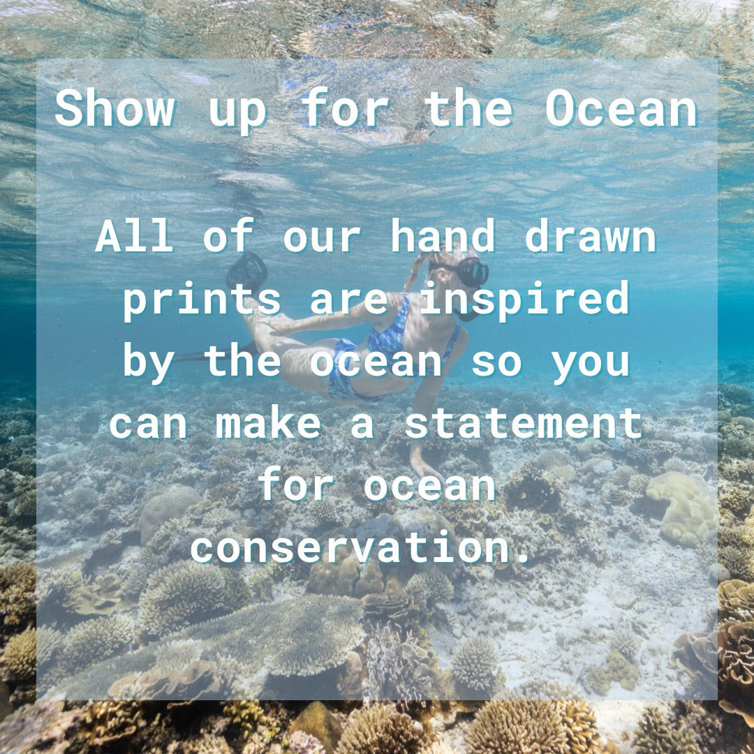 Livfortheocean free diving in our sour gummy whale shark high waisted bikini with text about our hand drawn swimsuit prints raising awareness for conservation. 